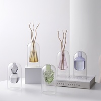 Diffuseur d'huiles essentielles d'intérieur simple haut de gamme moderne Ornement en verre d'arôme sans flamme Vase de table en rotin Bouteille vide pour