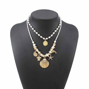 Collar de estilo bohemio con conchas marinas y estrellas de mar, ideal para vacaciones en la playa, con cuentas y piedras trituradas, en capas, para llevar alrededor de la clavícula. - Product Image 5