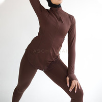 Ensemble haut et leggings de sport modeste haut de gamme personnalisé, haut de sport à col montant avec poches zippées, tenue de sport musulmane OEM ODM