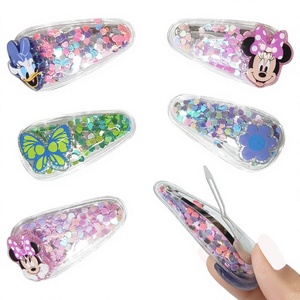 Pinzas y Broches para el Cabello de Tela con Diseño de Minnie y Daisy de Disney, 6 Piezas, con Confeti Mágico, para Fiestas, Originales y con Licencia H.E.R. Accesorios - Product Image 1
