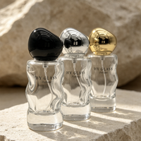 Flacon de parfum en verre sculpté unique de 50 ml, transparent, avec bouchon en métal noir, or, argent, atomiseur de parfum unisexe