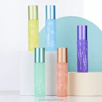 Vente en gros de flacons de parfum en verre à bille de 5 ml et 10 ml personnalisés, en brun et noir, avec boîte, design unique
