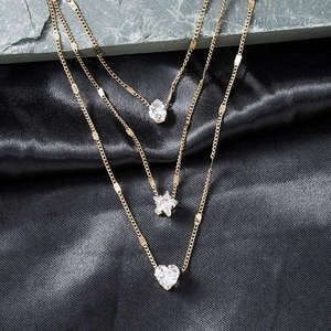 Venta al por mayor de joyería Unisex Vintage pentagrama multicapa amor corazón estrella circón encanto gota colgante 18K chapado en oro Retro - Product Image 1