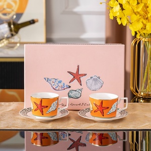 ชุดกาแฟและชาเซรามิกสไตล์เมดิเตอร์เรเนียน ลายปลาดาวสีส้ม ดีไซน์เปลือกหอย ทนทาน ชุดถ้วยน้ำชาพร้อมจานรอง บรรจุในกล่องของขวัญ - Product Image 1