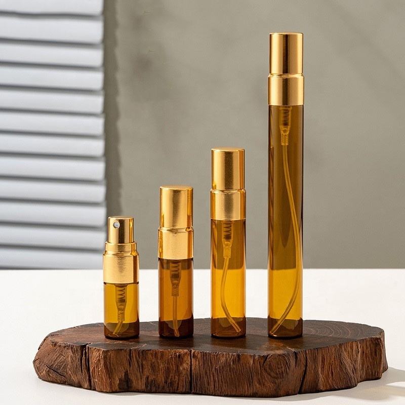 amber bottles with gold sprayer