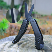 GHK28-AL Schwarzes Multitool-Rettungswerkzeug mit Sicherheitsschere, Feuerstarter, Säge, Glasbrecher, Klappmesser, Zange, EDC