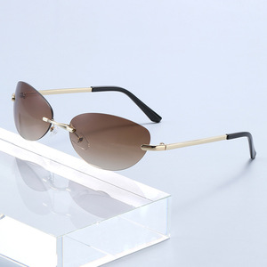 Lunettes de soleil œil-de-chat sans monture Y2K avec logo personnalisé, branches métalliques vintage 2026, protection UV400 pour hommes et femmes - Product Image 1