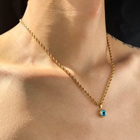 Collier en acier titane avec pendentif rond œil de démon rétro à la mode française INS, chaîne torsadée tendance