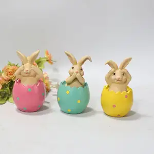 Coniglietti di Pasqua colorati in resina europea seduti sul guscio d'uovo senza ascoltare NO dire che non vedo coniglietti di vendita caldi polyresin figura animale