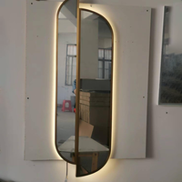 BOYIN Salle de bain Vente en gros Commode murale intelligente avec miroir de maquillage ondulé et armoire avec lumières LED Corps complet pour salle de bain et table