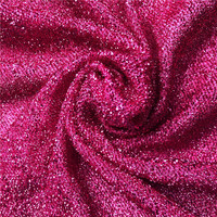 Tissu tricoté en polyester de haute qualité doré Tissu brillant à mailles élastiques pour robe à paillettes