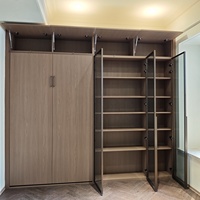 Meuble combiné moderne pour chambre d'appartement : Lit escamotable Murphy, bibliothèque, portes vitrées, quincaillerie haut de gamme, écologique, espace modulaire
