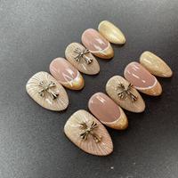 Ongles artificiels faits main de haute qualité, forme amande, style doré, réutilisables, vente en gros usine