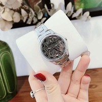 Jam Tangan Wanita Quartz High-End untuk Bisnis Fashion, Desain Hollow Elegan, Bahan Stainless Steel, Kristal Safir, Tahan Air 30M, 20mm