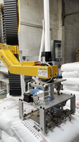Désengaucheteuse mobile sur rail |   Bras robotique flexible pour le déchargement de sacs et l'alimentation des matériaux |   Sacs de 25 à 100 kg, 100 à 120 sacs/h.