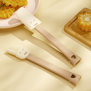 Silicone Scraper With Smiley Face Design For Baking And Spreading Butter Or Oil On Bread - Product Image 2