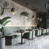 Ron Group - Mobilier de restaurant et d'hôtel écologique : Banquette en forme de L rembourrée en velours et table carrée en bois