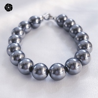 Bracelet perlé classique élégant BS6 10mm perles noires avec contraste chatoyant pour les anniversaires