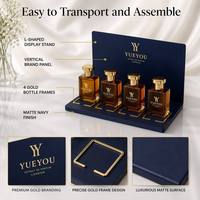 Support de Présentation de Parfums Moderne en Acrylique Bleu Marine en Forme de L, Portable et Démontable, avec 4 Supports Dorés pour Bouteilles de Parfum, Présentoir de Luxe pour Produits de Beauté