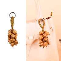 Handgeweven fruitenschelp rammelaartas om te hangen, druivendraad geluid genezend hangende bel fruit hangend ornament rugzak sleutelhanger