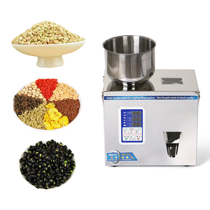 Machine de remplissage automatique pour céréales, haricots, flocons d'ail, morceaux de piment, épices, avec pesage quantitatif et remplissage, facile à utiliser - Product Image 1