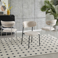 Chaise de salle à manger en velours bouclé - Moderne, dossier incurvé blanc, rembourrée avec pieds en métal noir