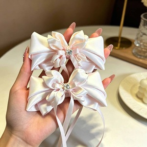 A super cute orchid flower hair <b>clip</b> with a resort vibe, perfect for elegant bangs and a sweet new hair accessory to match your - Product Image 5
