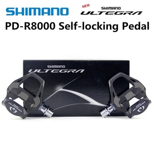 Pédales de PD-<span class=keywords><strong>R8000</strong></span> <span class=keywords><strong>Shimano</strong></span> <span class=keywords><strong>Ultegra</strong></span> Pédales de vélo de route avec SPD-SL de crampons <span class=keywords><strong>R8000</strong></span> Pédale SM-SH11 jeu de crampons - Product Image 1