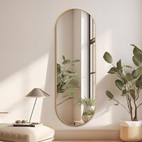 Miroir mural ovale avec cadre en aluminium doré opulent ornement de salon maison réflexion complète du corps pour un habillage gracieux et élégant.