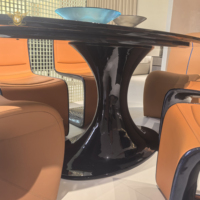 Table à manger ovale avec chaises, design italien, luxe léger, plateau en fibre de carbone, vente directe d'usine Foshan