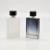Bouteille de parfum en verre de haute qualité de 50ml vide semi-transparent noir et blanc avec bouchon en plastique conception ODM personnalisée