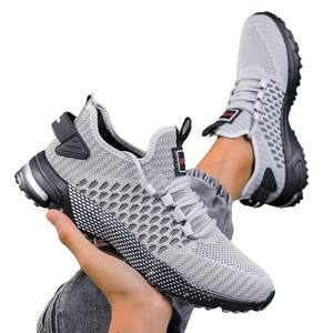 รองเท้าวิ่งตาข่ายน้ำหนักเบาสำหรับผู้ชาย รองเท้าเทนนิสแบบผูกเชือก สวมใส่สบาย ระบายอากาศได้ดี กันลื่น ใช้ได้ทุกฤดู เหมาะสำหรับออกกำลังกายกลางแจ้ง - Product Image 4