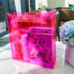 Bolsa de regalo iridiscente holográfica promocional al por mayor, bolsa de compras de PVC transparente con láser a la moda de color personalizado