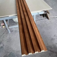 Décoration intérieure Grille en PVC Panneau mural Panneau cannelé en composite bois plastique WPC