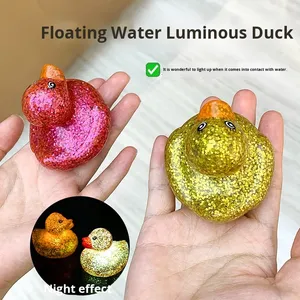 Hot-Selling 6Cm Children's <b>Bath</b> Toy Gold Glitter Water-Playing Cartoon Glowing Little Yellow Duck Abs Plastic - Product Image 3