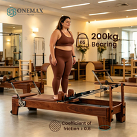 ONEMAX Reformer de Pilates en bois massif avec roues mobiles, logo personnalisé acceptable, lit d'entraînement Pilates pour le renforcement du tronc