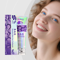 Vente en gros de 1000 pièces de dentifrice menthe violette avec logo personnalisé, améliore la luminosité du sourire et l'hygiène bucco-dentaire
