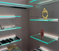 Vêtements de mode personnalisés pour magasins de détail Meubles de présentation murale en bois Étagère acrylique à LED Étagère de présentation murale à vendre