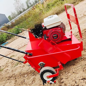 Máquina de desbloqueo de compactación de suelo empujada a mano de gasolina pequeña para construcción de pastizales naturales Perforador de césped para pequeña escala - Product Image 1