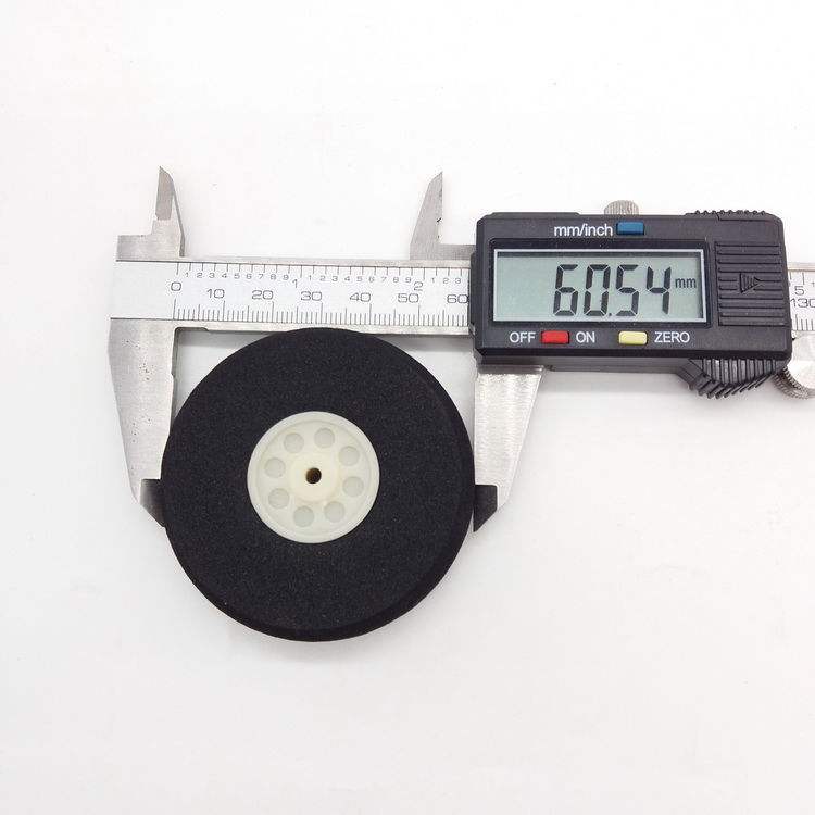 เส้นผ่านศูนย์กลาง 60 มม., รูรับแสง 3.1 มม.