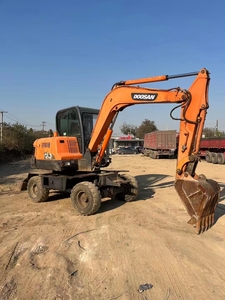 Excavatrice sur pneus d'occasion pas chère Doosan DX60W, capacité de godet 0,2 m³, pour travaux routiers - Product Image 2