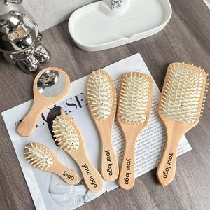 หวีไม้ไผ่ขนาดเล็กพร้อมเบาะแปรงหวีผมหวีนวดหนังศีรษะสำหรับผมทุกประเภทโลโก้ออกแบบได้ตามต้องการ - Product Image 1