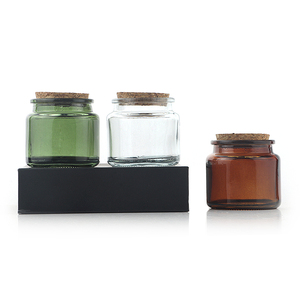 Venta al por mayor 70g tarro de vela pequeño vacío con tapa de corcho 80ml tarro de almacenamiento de vidrio verde ámbar personalizado con tapón tarro de hechizo - Product Image 1