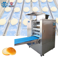 Machine industrielle de division et de façonnage de pâte, haute capacité, pour la production de boules de pâte, équipement de boulangerie pour la fabrication de pains, brioches et autres produits de boulangerie.