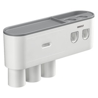 Presse-dentifrice électrique mural Porte-brosse à dents sans poinçon avec rince-bouche en plastique durable Fabricant direct