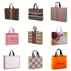Sac moyen imprimé non tissé laminé écologique avec poignée en ruban et fermeture épaule, personnalisable avec logo, haute qualité, conception gratuite usine - Product Image 1