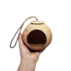 प्राकृतिक नारियल के खोल पक्षी शुद्ध हस्तनिर्मित नारियल के खोल झोपड़ी बर्ड नेस्ट हाउस सस्ते कीमत घर के लिए पीईटी/नारियल के खोल सामान