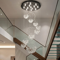 Grand lustre en cristal hélicoïdal avec sphères en cascade, hauteur réglable, lumière LED chaude pour la décoration de hôtels de luxe et de halls d'entrée