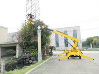 Nacelle élévatrice à flèche montée sur remorque, de qualité industrielle, certifiée CE, haute capacité et robuste