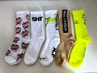 Chaussettes de sport pour hommes en coton 100% avec logo personnalisé, nouveau design, broderie jacquard, chaussettes hautes tendance pour le printemps